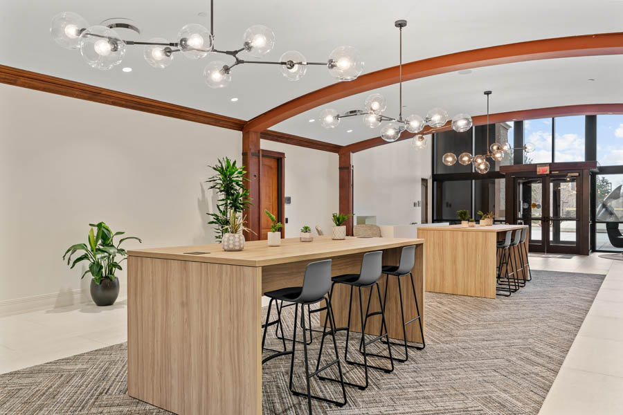 Main floor lobby area with hightop working space.